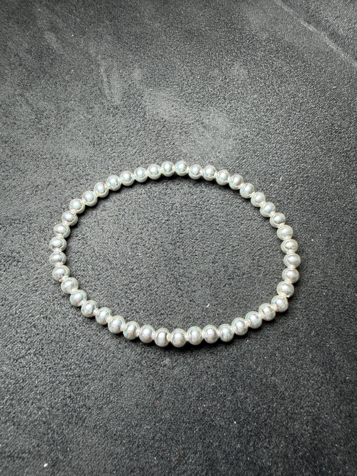 A21 Polished Silver Bead Stretch Bracelet