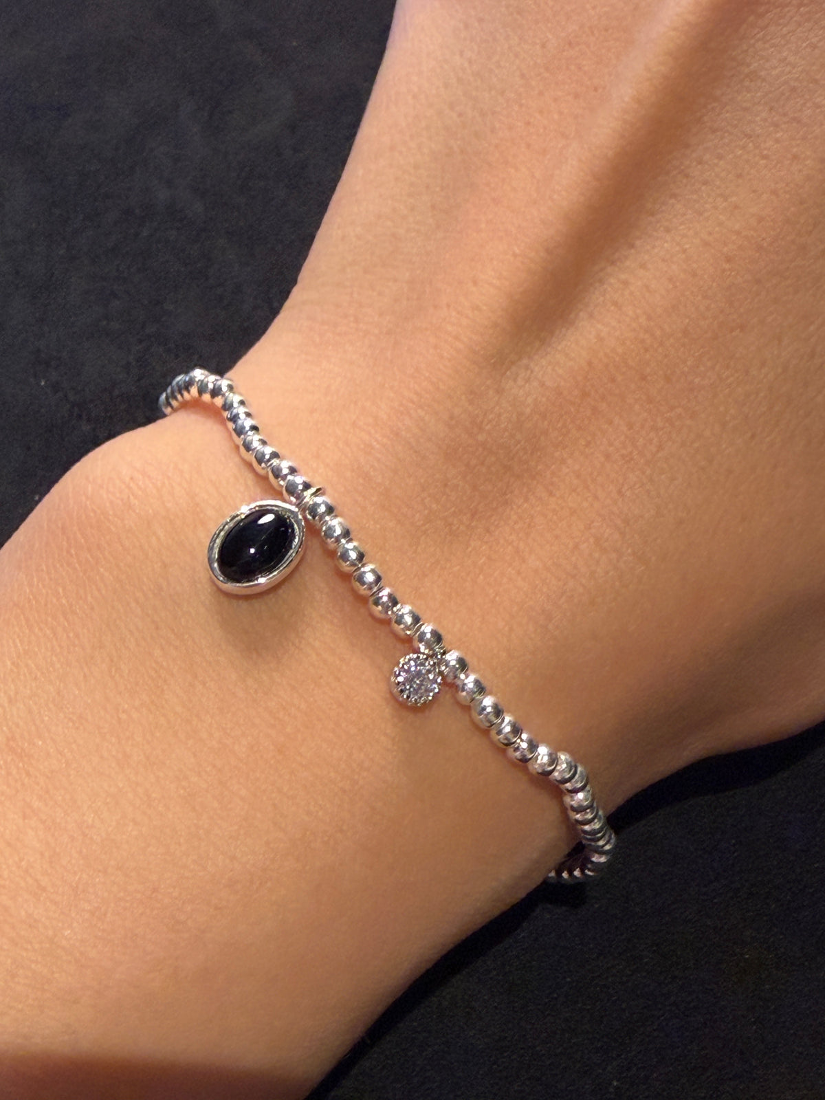A23 Black Oval Charm Silver Stretch Bracelet