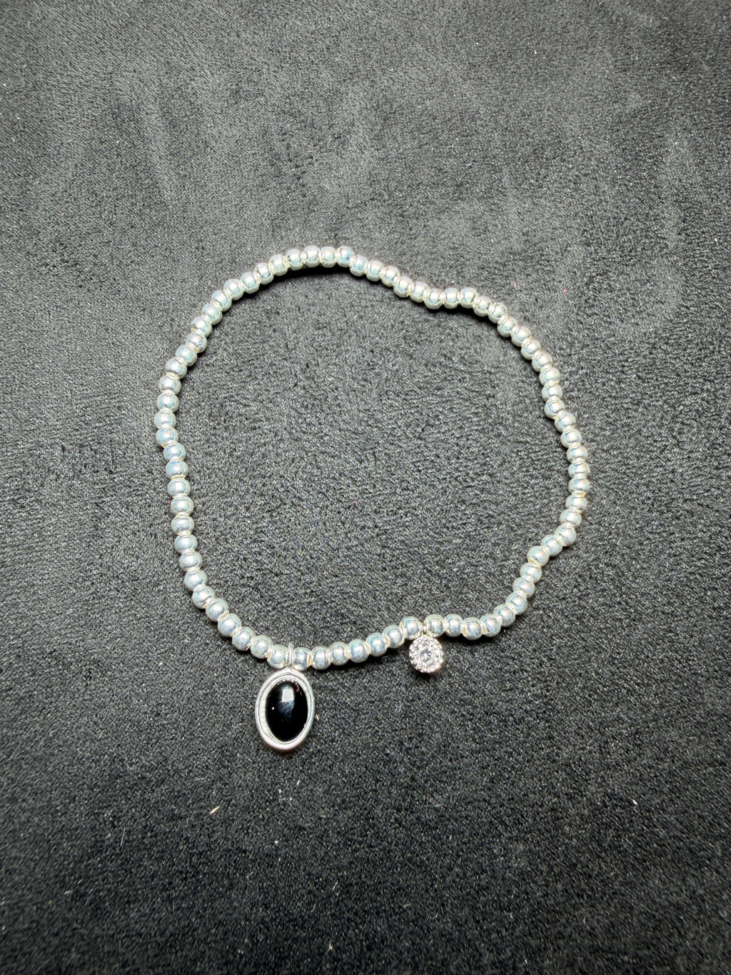 A23 Black Oval Charm Silver Stretch Bracelet