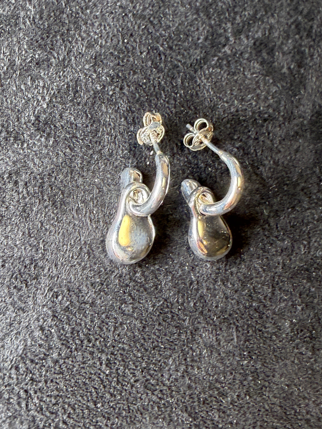 A04 Molten Loop Silver Earrings
